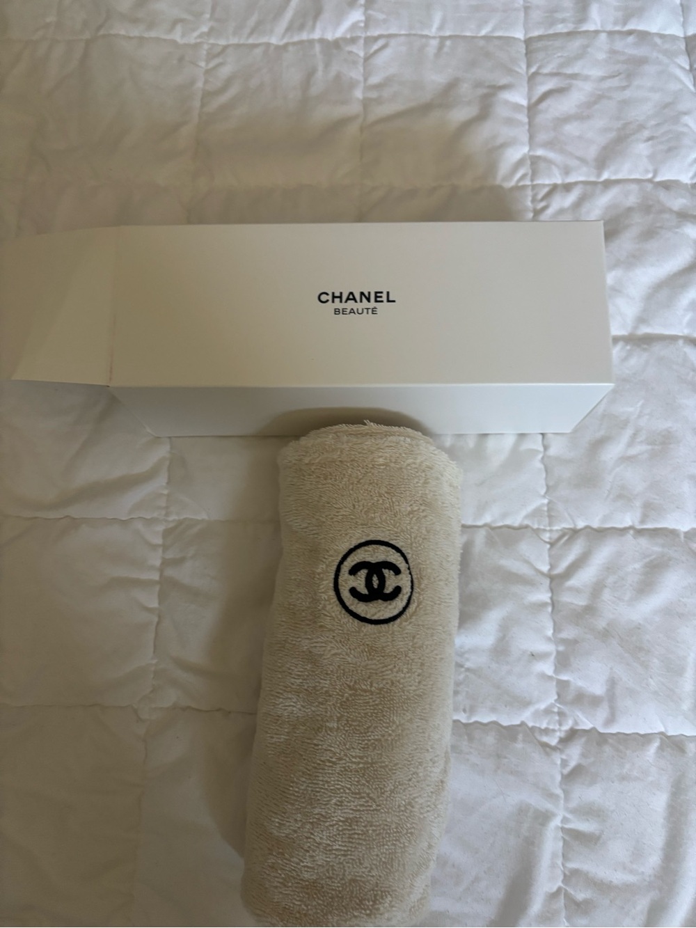 CHANEL beige towel with black CC logo
